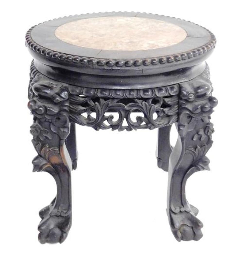 Appraisal: ASIAN Chinese marble inset top circular stand carved wood frieze