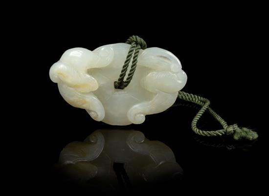 Appraisal: Sale Lot A Carved Jade Toggle the celadon stone having