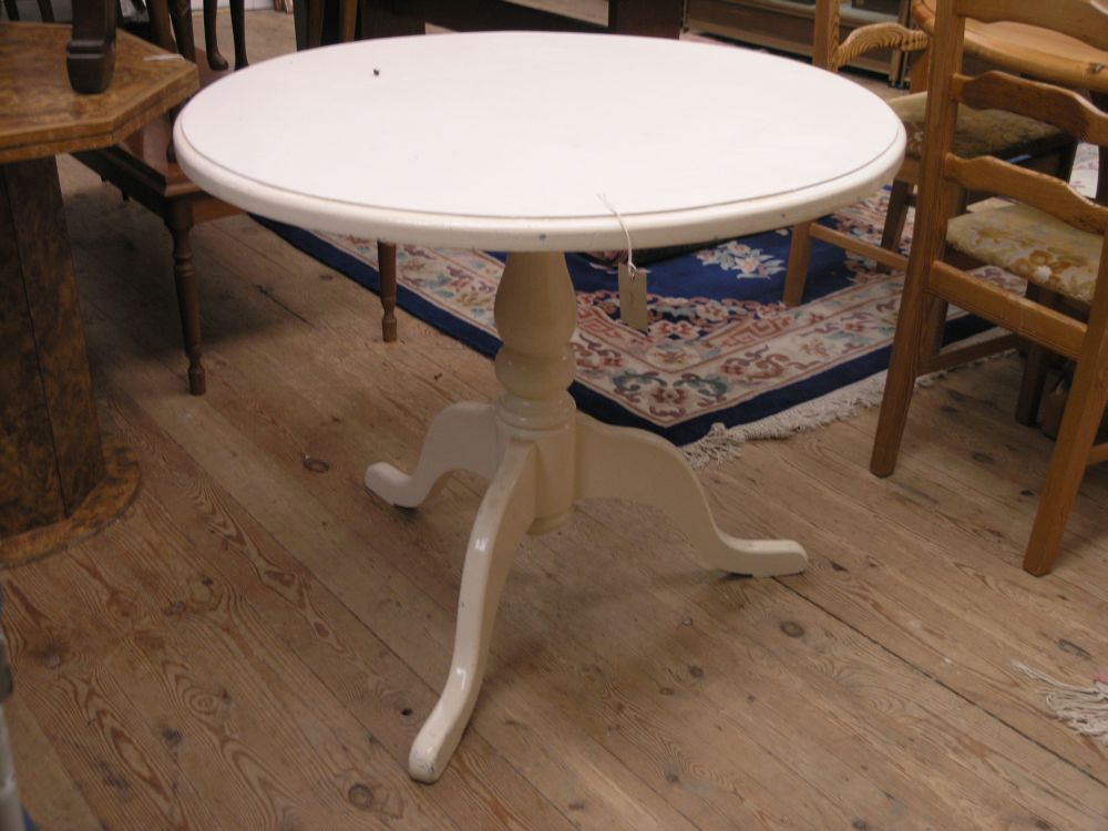 Appraisal: A white painted tripod table with circular top and baluster