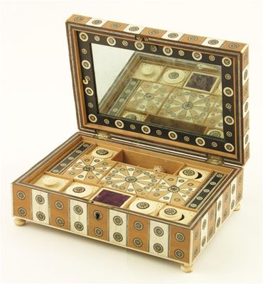 Appraisal: An Anglo-Indian ivory sandalwood and sadeli work sewing box the