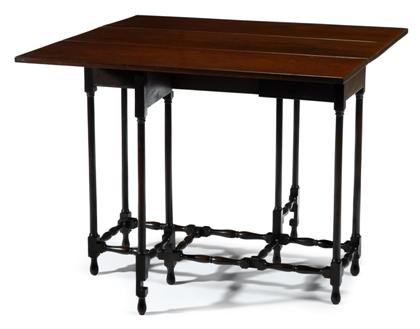 Appraisal: George III mahogany 'spider-leg' tea table The narrow rectangular top