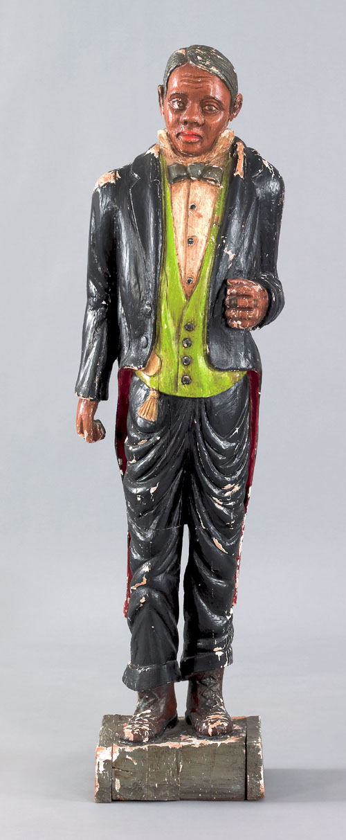 Appraisal: Rare carved and painted pine figure of a black butler