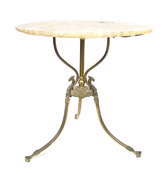 Appraisal: A gilt brass and onyx oval table height in width