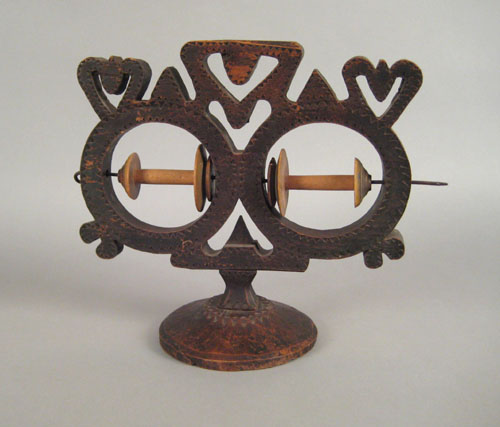 Appraisal: Continental carved yarn winder th c with sawtooth decoration h