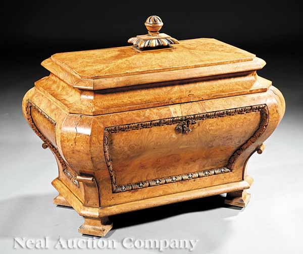 Appraisal: A Dutch Rococo-Style Carpathian Elm Burlwood Cellarette th c bombe