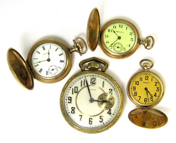 Appraisal: FOUR NORTH AMERICAN POCKET WATCHES Waltham hunter case model Sapphire