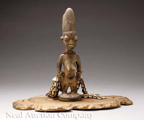 Appraisal: Yoruba Nigeria Female Ibeji mixed media and wood carved figure