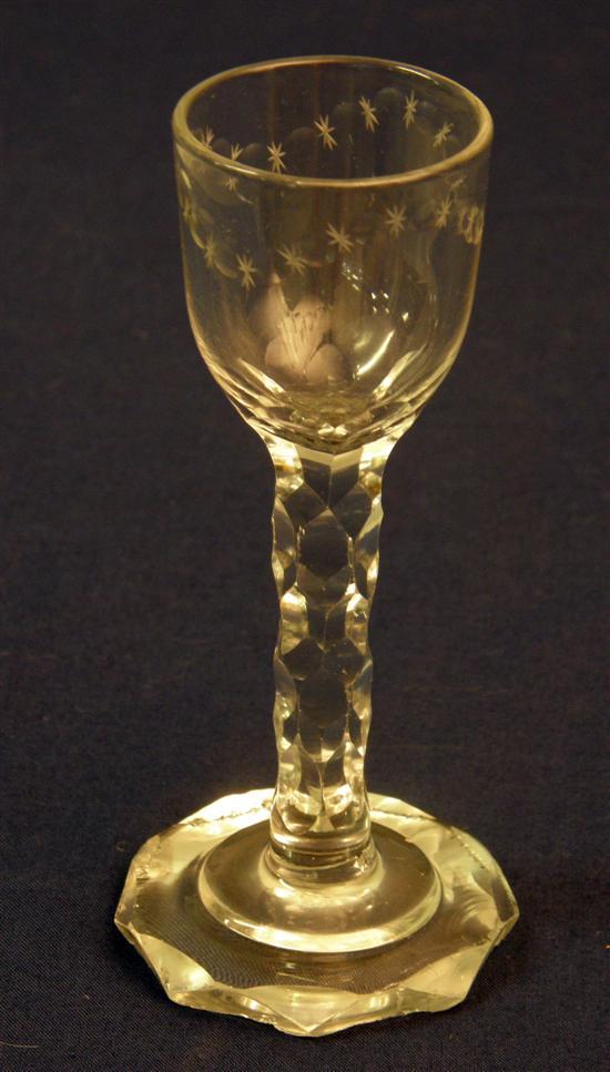 Appraisal: th century wine glass the bowl cut with repeating circles