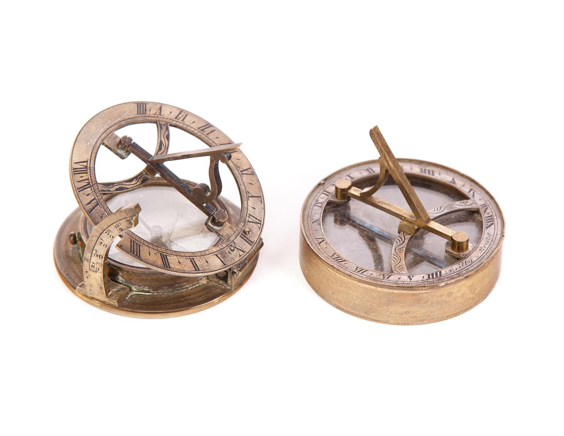 Appraisal: TWO EUROPEAN BRASS COMPASS SUNDIALS Nineteenth century One with lid