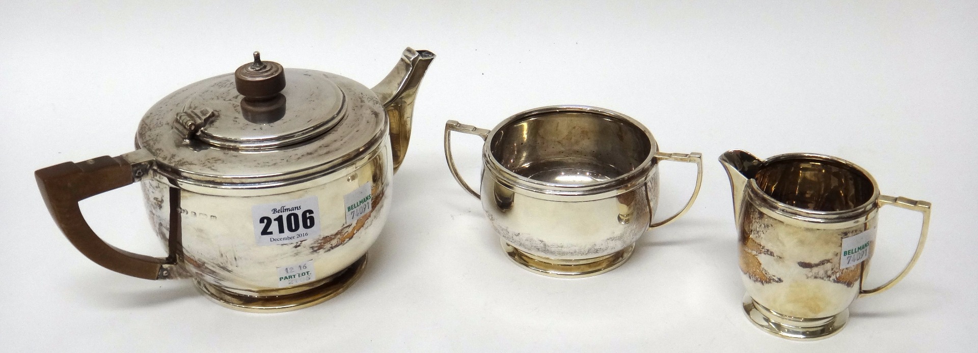 Appraisal: A silver three piece tea set comprising a teapot and