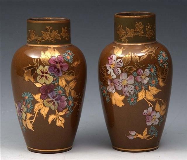 Appraisal: A PAIR OF SMALL POTTERY VASES on cafe au lait