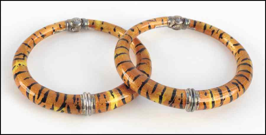 Appraisal: PAIR OF ITALIAN STERLING SILVER AND ENAMAL TIGER STRIPE BRACELETS