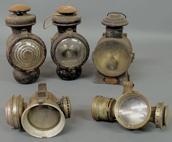 Appraisal: Two early Ford automobile fluid lamps h and three other