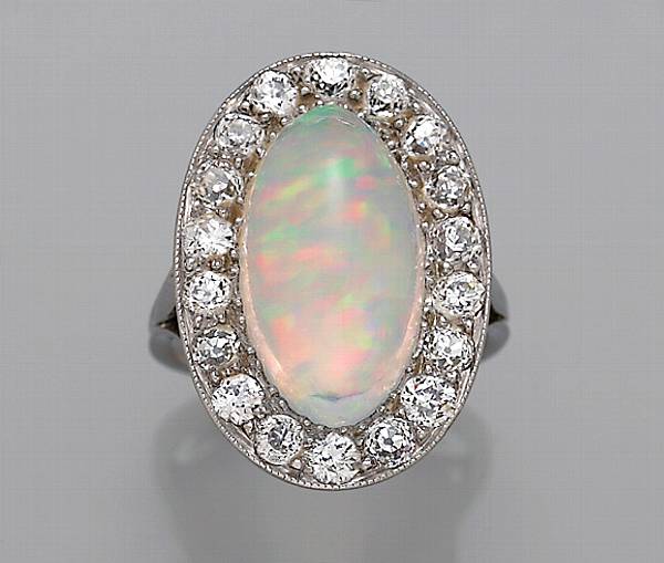 Appraisal: A crystal opal diamond and platinum ring estimated total diamond