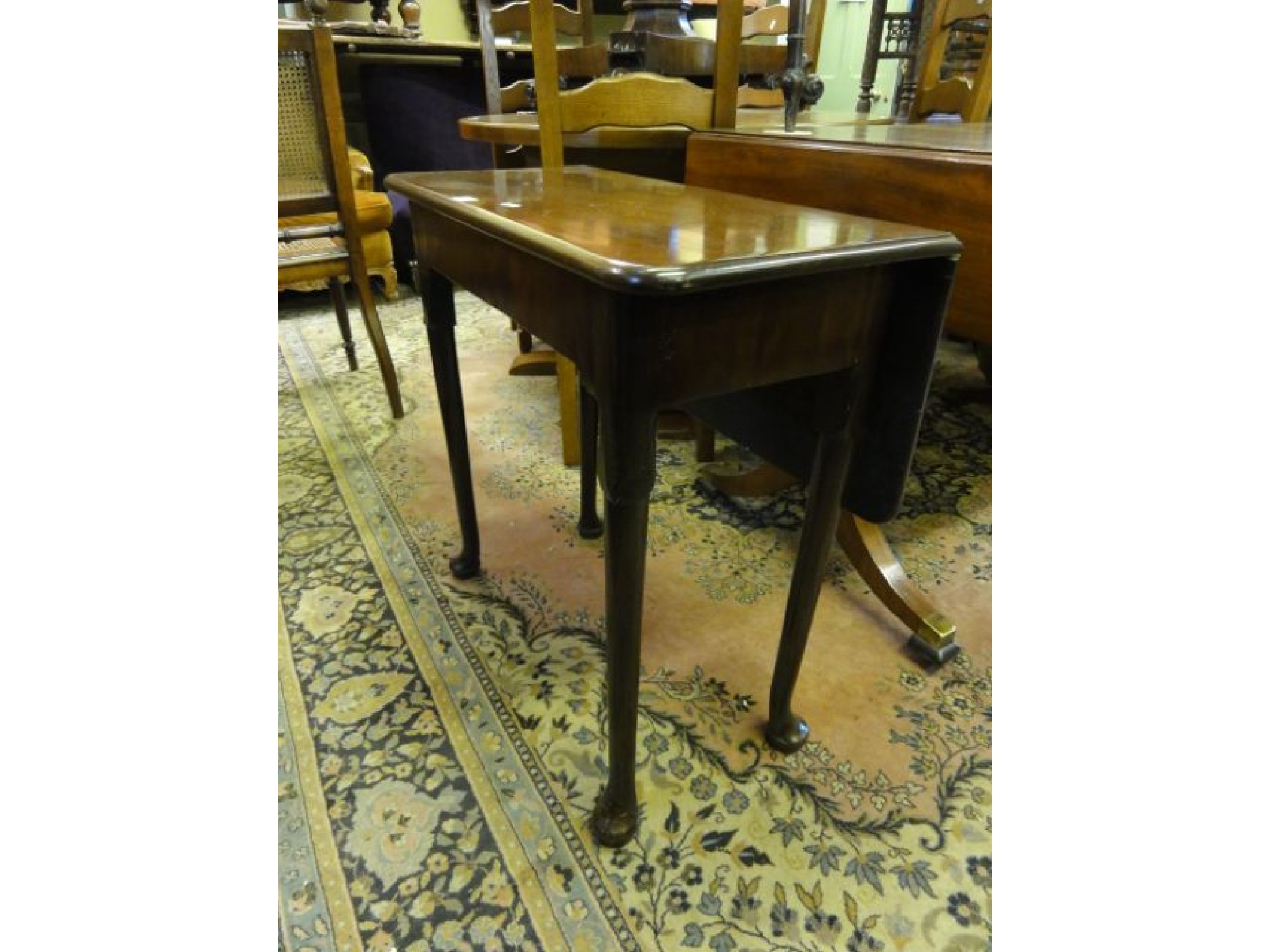 Appraisal: A small George III mahogany side table with single drop