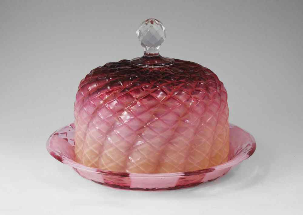 Appraisal: ART GLASS CHEESE DOME AND TRAY Clear crystal finial with