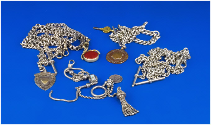 Appraisal: Collection Of Six Albert Chains Together With Fobs T Bars