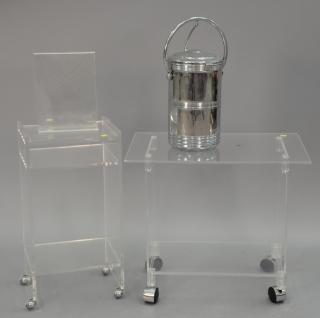 Appraisal: Two lucite carts lucite picture frame and ice champagne bucket