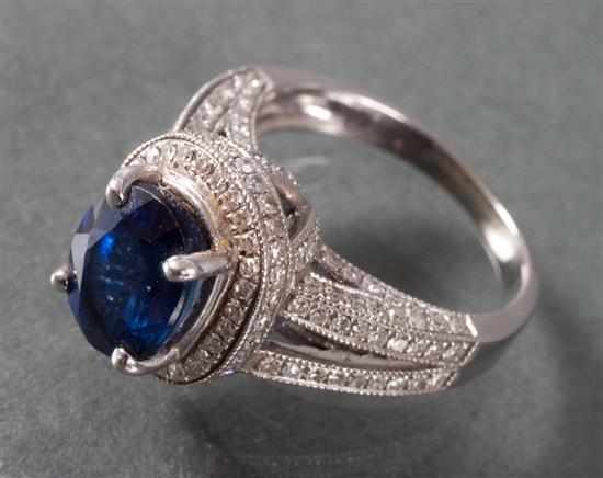 Appraisal: K white gold diamond and sapphire ring center oval-cut sapphire