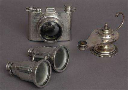 Appraisal: TWO ENGLISH PEWTER NOVELTY FLASKS AND A MEXICAN SILVER LAMP