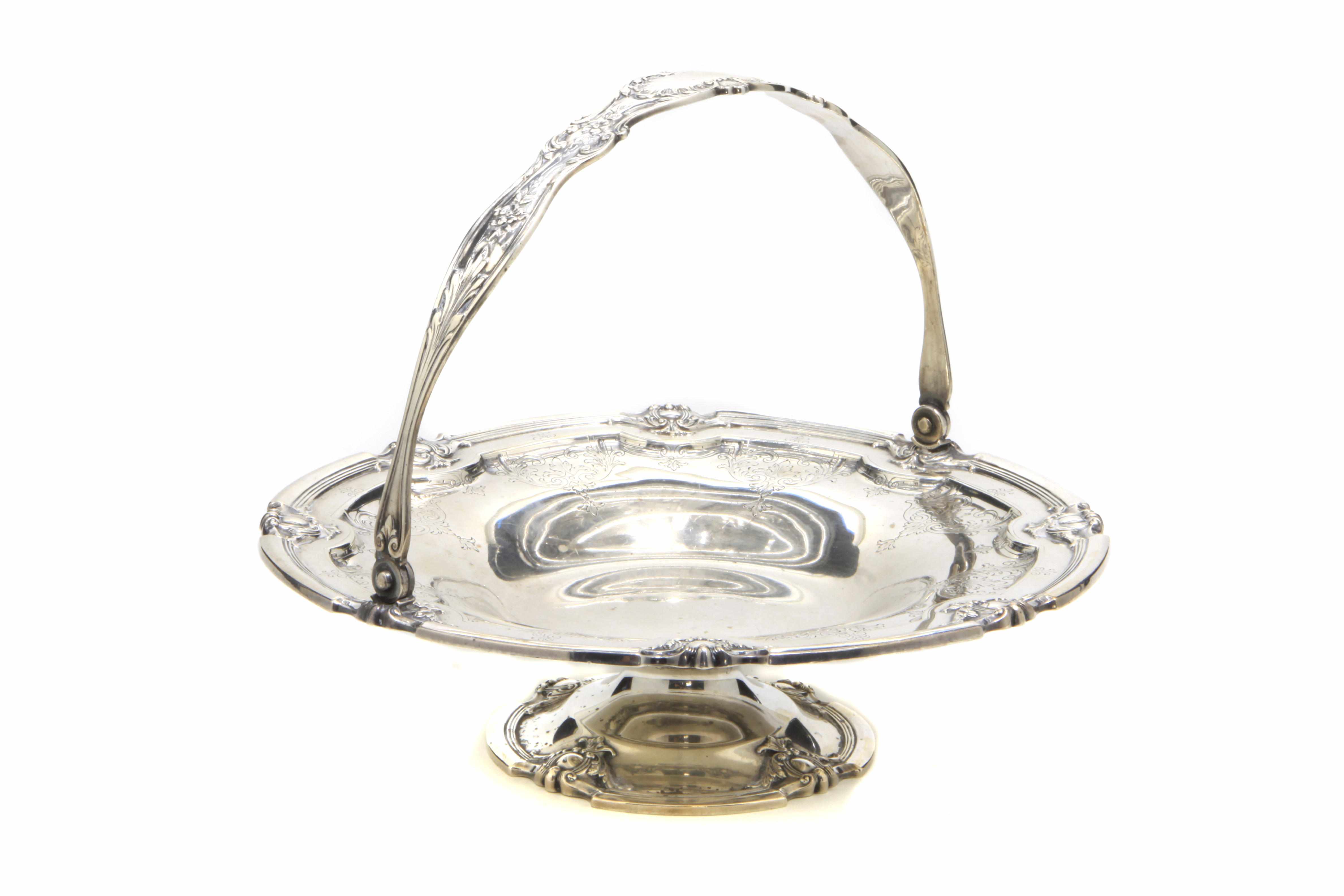 Appraisal: An American sterling silver footed cake stand Graff Washbourne Dunn