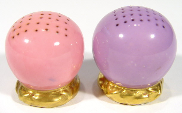 Appraisal: Pair of Royal Worcester china pounce pots painted in pink