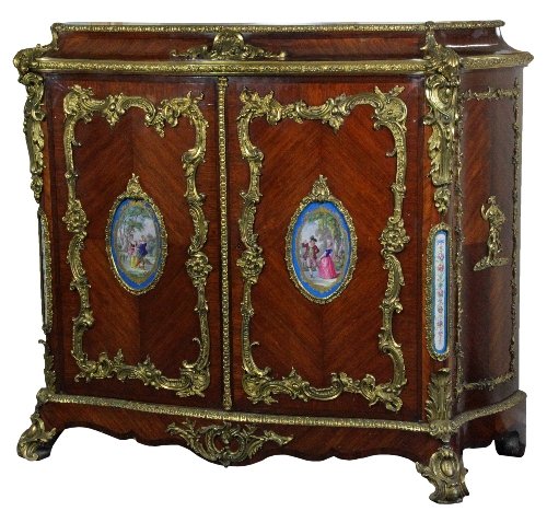 Appraisal: A Louis XV style serpentine fronted cabinet with ormolu mounts