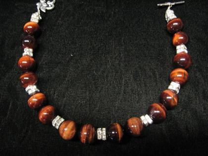 Appraisal: Tiger Eye and crystal necklace Round deep rose colored tiger