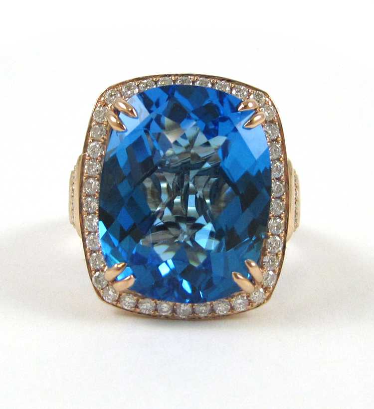 Appraisal: BLUE TOPAZ DIAMOND AND FOURTEEN KARAT ROSE GOLD RING with