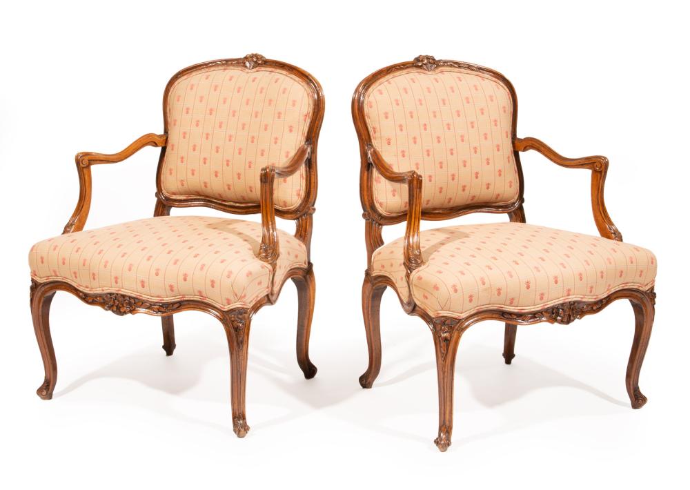 Appraisal: PAIR OF LOUIS XV CARVED FRUITWOOD FAUTEUILSPair of Louis XV