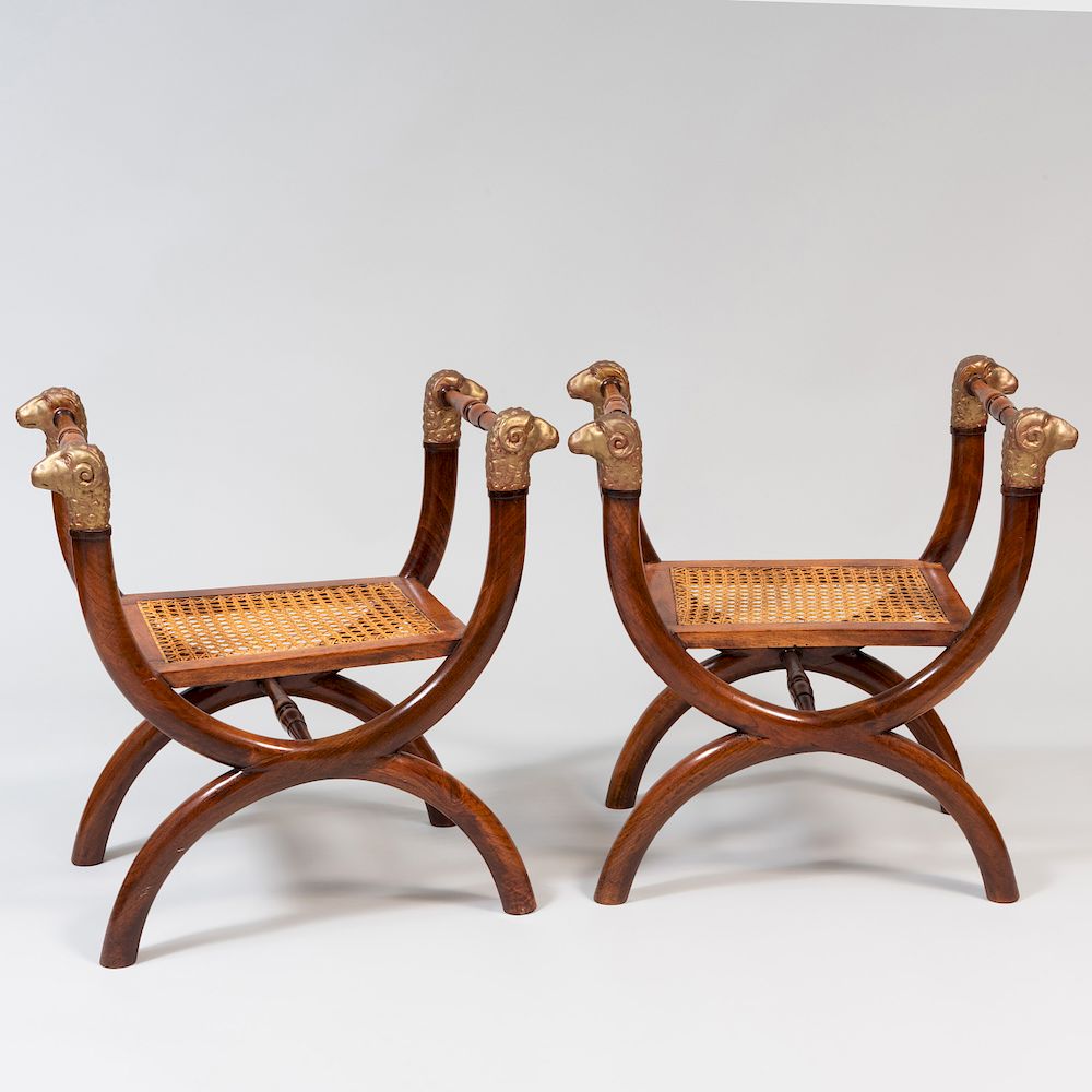 Appraisal: Pair of Italian Walnut Parcel-Gilt and Caned Curule Stools x