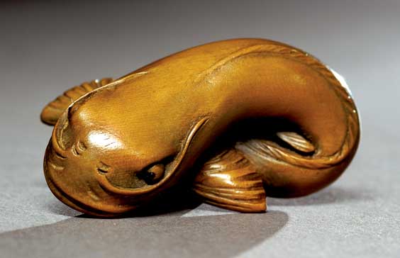 Appraisal: ANTIQUE BOXWOOD NETSUKE Antique boxwood netsuke in the form of