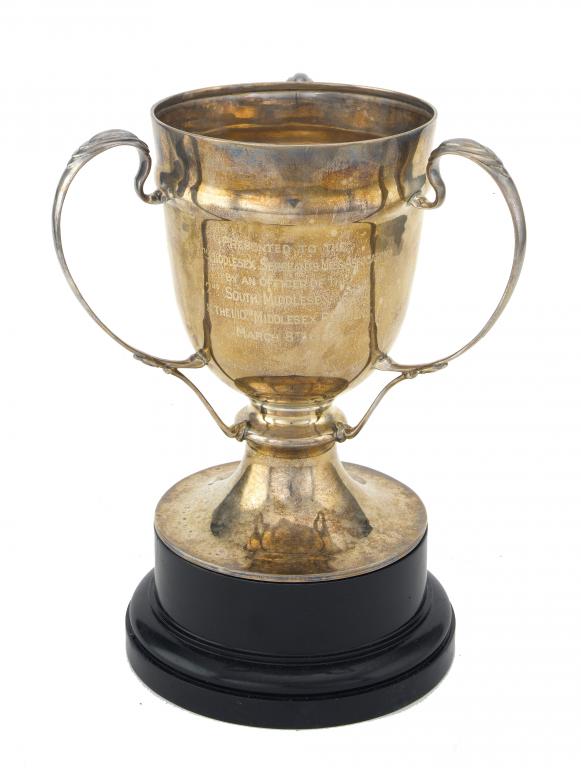 Appraisal: AN EDWARD VII THREE HANDLED CUP on flared foot engraved