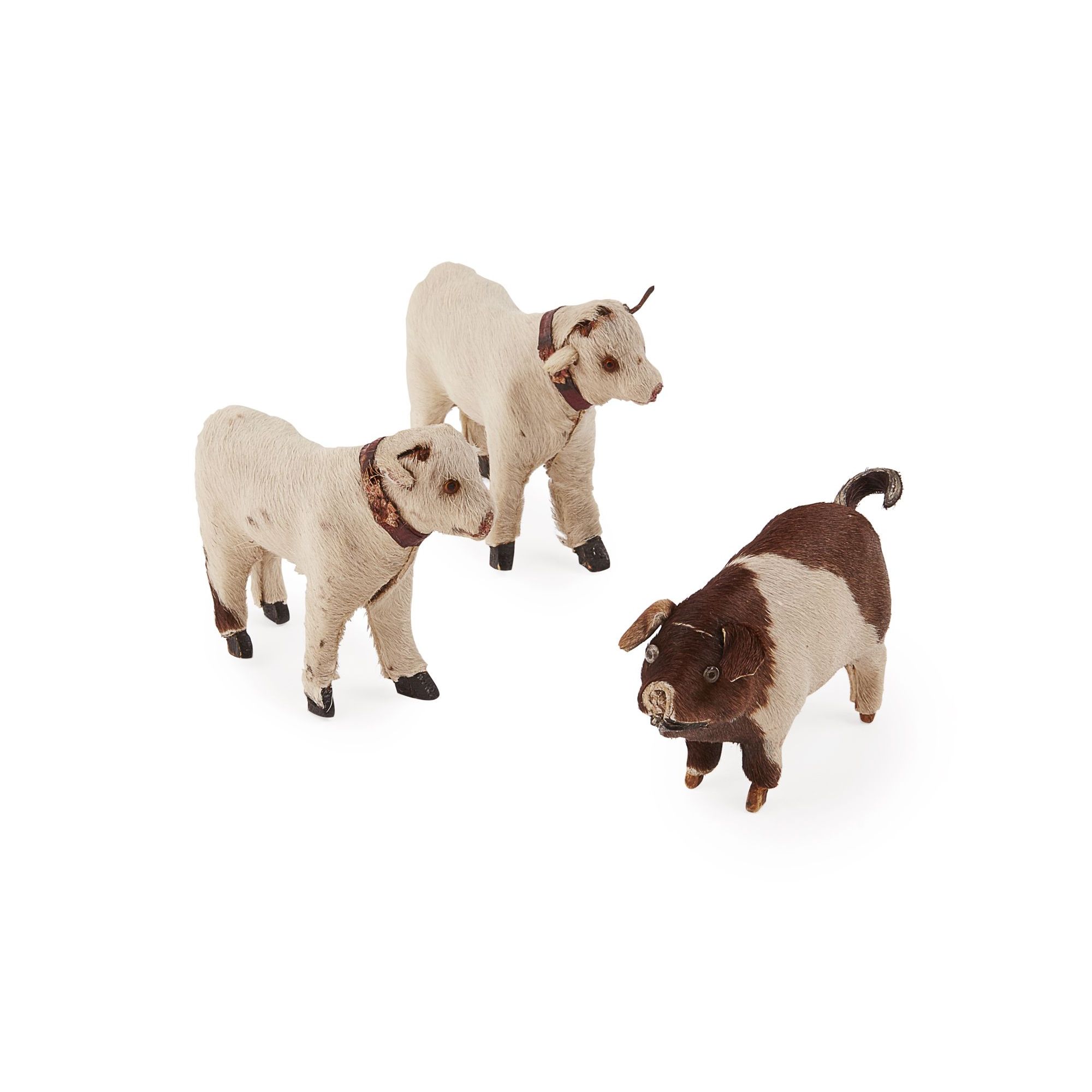 Appraisal: TRIO OF WOODEN FARM ANIMALS a pair of goats and