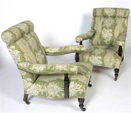 Appraisal: PAIR OF VICTORIAN WALNUT UPHOLSTERED ARMCHAIRS CIRCA the scroll backs