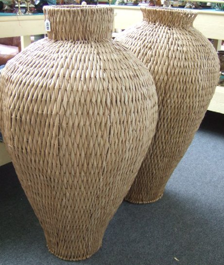 Appraisal: A large pair of rattan baluster shaped vases cm high