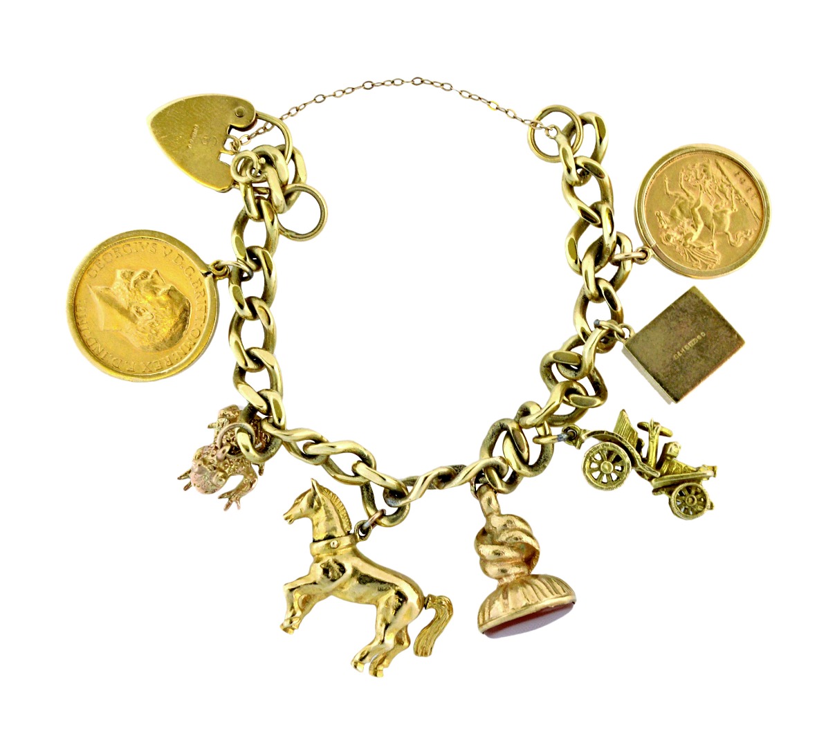 Appraisal: A ct gold curb link 'charm' bracelet hung with a