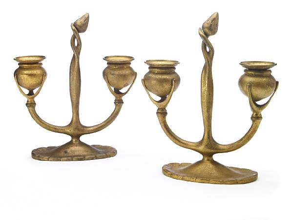 Appraisal: A pair of Tiffany Studios gilt-bronze two-arm candelabra circa each