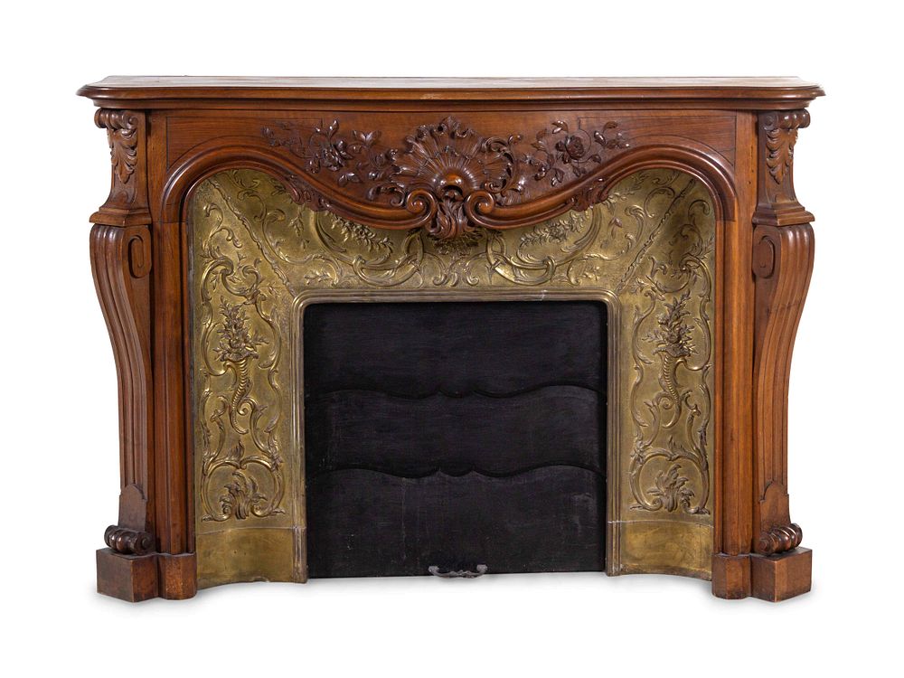 Appraisal: A Louis XV Style Carved Walnut and Pressed Gilt Metal