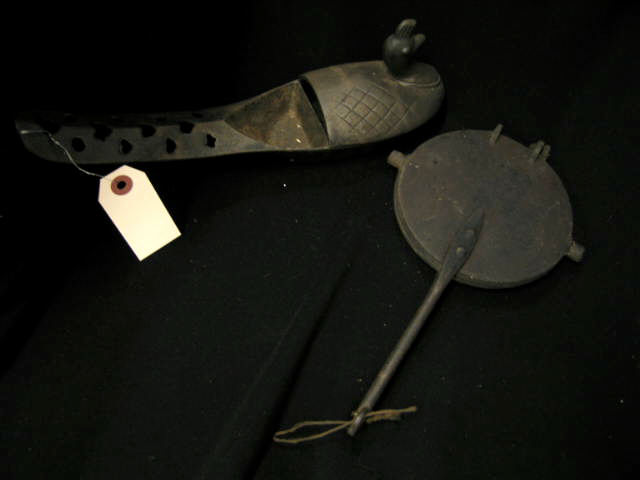 Appraisal: Cast Iron Fireplace Implements waffle iron figural piece