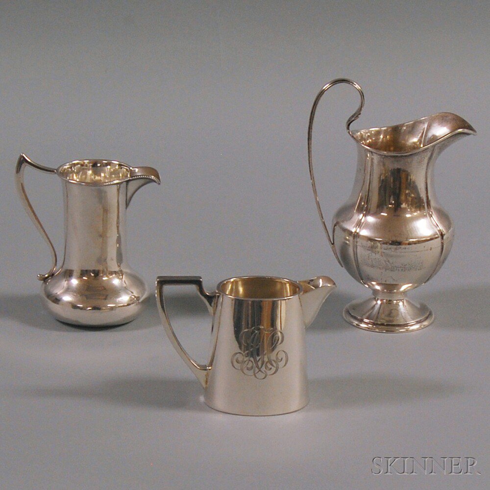 Appraisal: Three Silver Cream Pitchers one marked Edward Sons Glasgow one