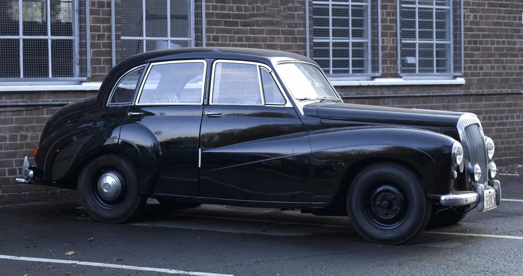 Appraisal: A DAIMLER CONQUEST CENTURY LITRE SALOON black with hide upholstery