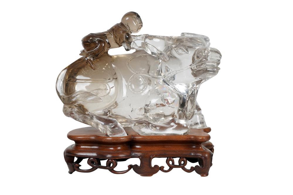 Appraisal: CHINESE ROCK CRYSTAL CARVED WATER BUFFALOresting on a fitted wood