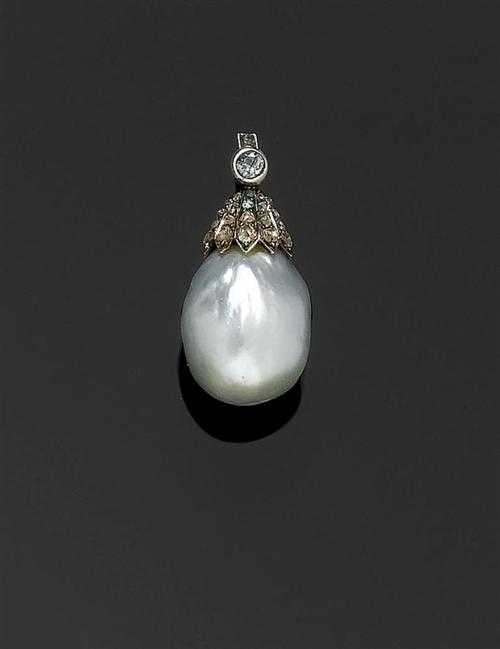 Appraisal: NATURAL PEARL AND DIAMOND PENDANT ca Platinum and silver over