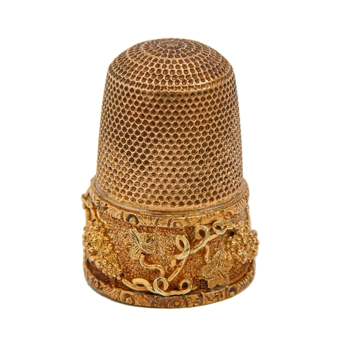 Appraisal: A gold thimble c with skirt of finely applied and