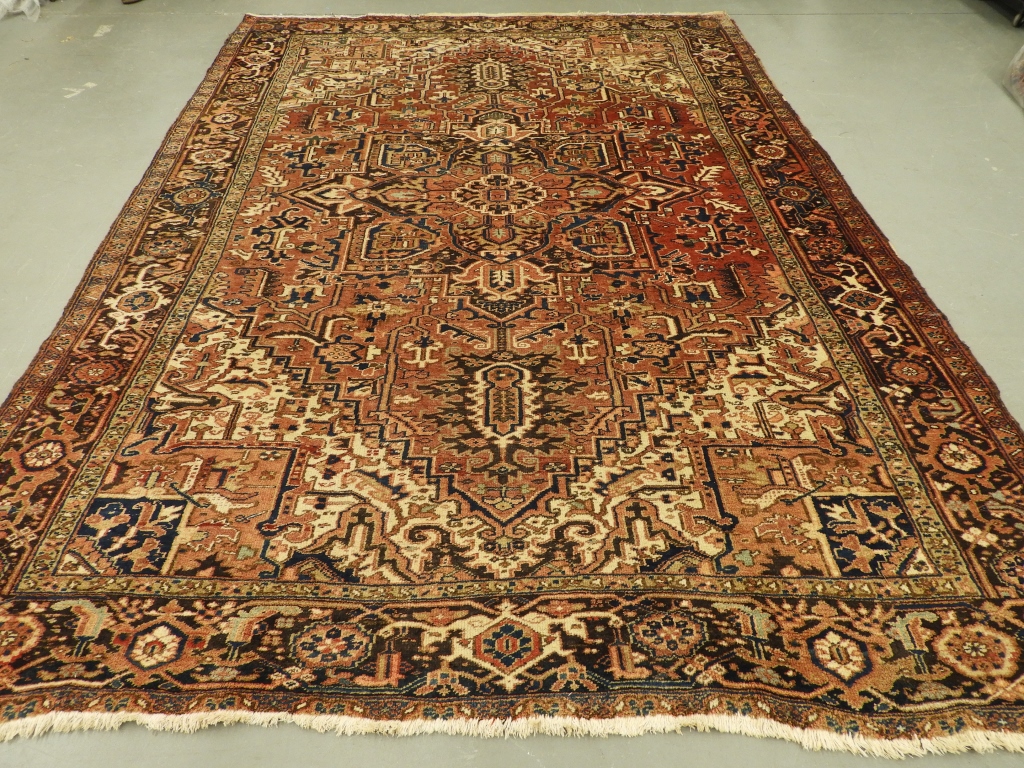 Appraisal: C PERSIAN MIDDLE EASTERN HERIZ CARPET RUG Persia Circa Red