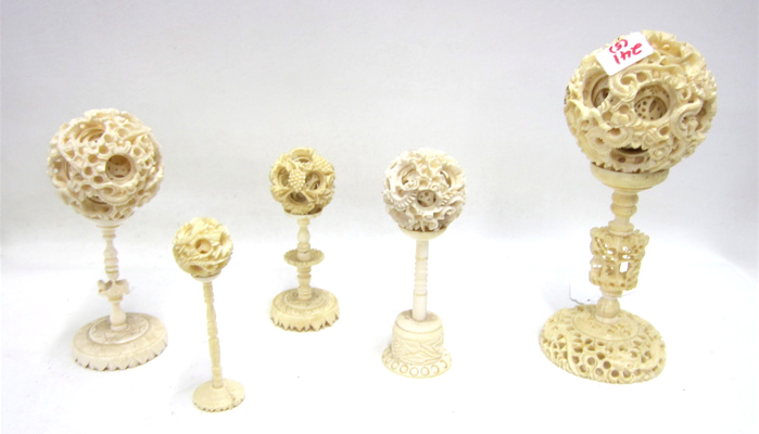 Appraisal: FIVE CHINESE IVORY BALLS OF MYSTERY having multi-layers of hand