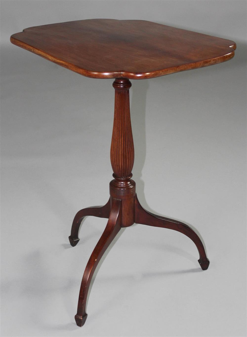 Appraisal: FEDERAL MAHOGANY TILT TOP CANDLESTAND the shaped rectangular top over