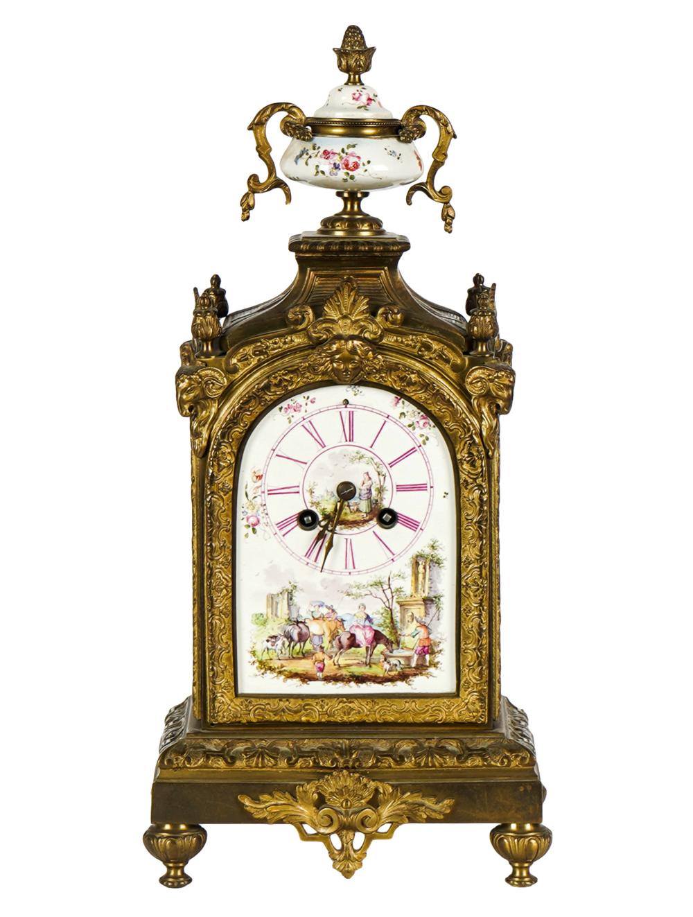 Appraisal: FRENCH GILT METAL PAINTED PORCELAIN MANTLE CLOCKthe dial unsigned the