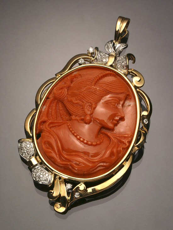 Appraisal: -Karat Yellow-Gold Orange Coral Cameo and Diamond Pendant Having a